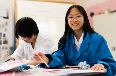 A pupil enjoying an Art class