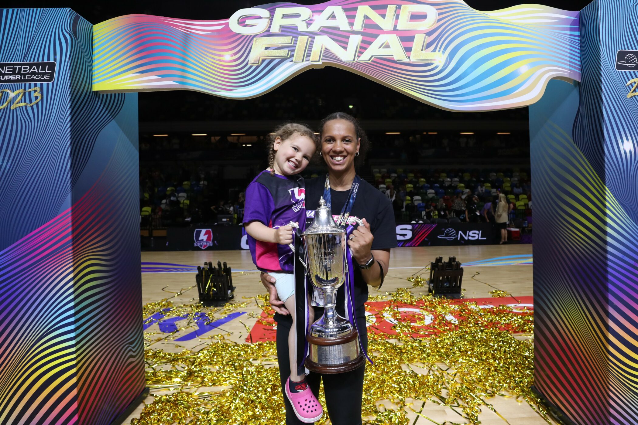 Lauren Nicholls with the Netball Super League trophy