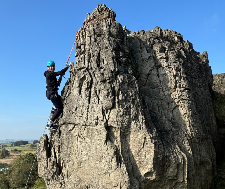 a child rock climbing